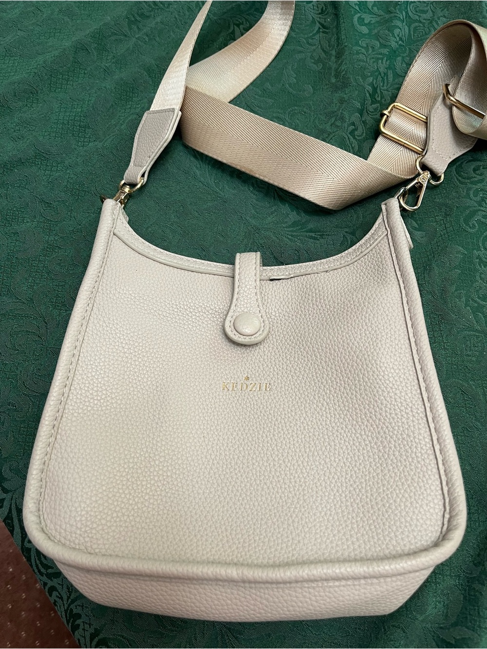 Kedzie Pebbled Leather Crossbody Bag in Light pink